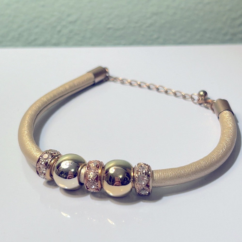 Elegant Gold and Cream Faux Leather Bracelet